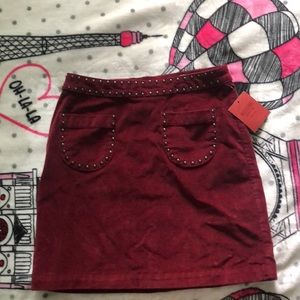 A Maroon skirt
